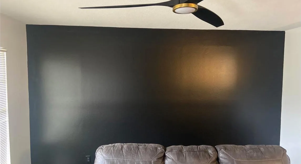 The same view before — a plain painted feature wall