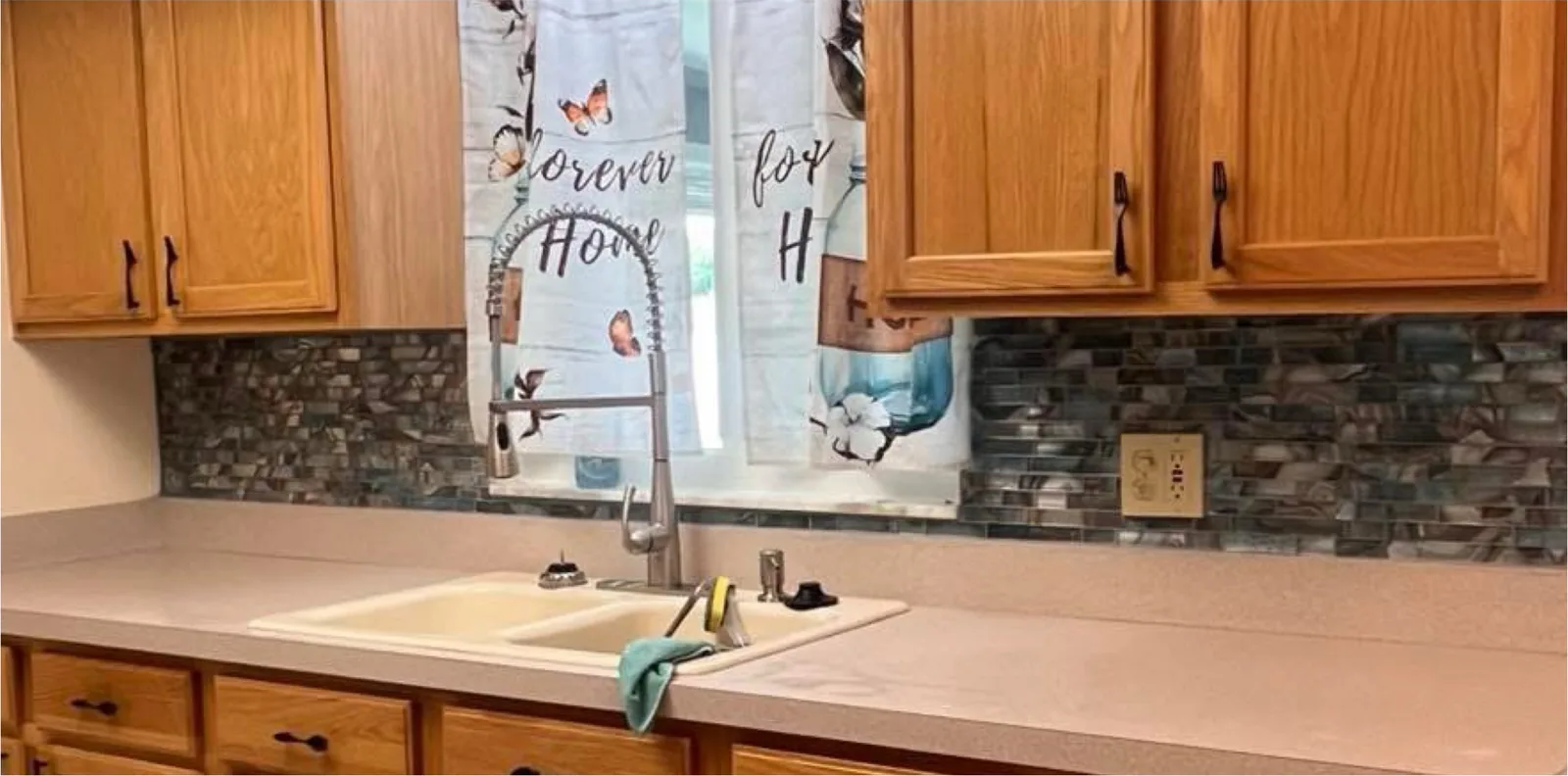 Backsplash & Countertops after the work — a tiled backsplash and new countertops