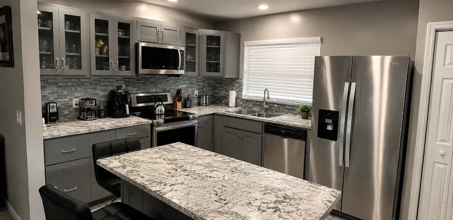 Grey Shaker Kitchen after the work — grey shaker cabinets with new counters and hardware