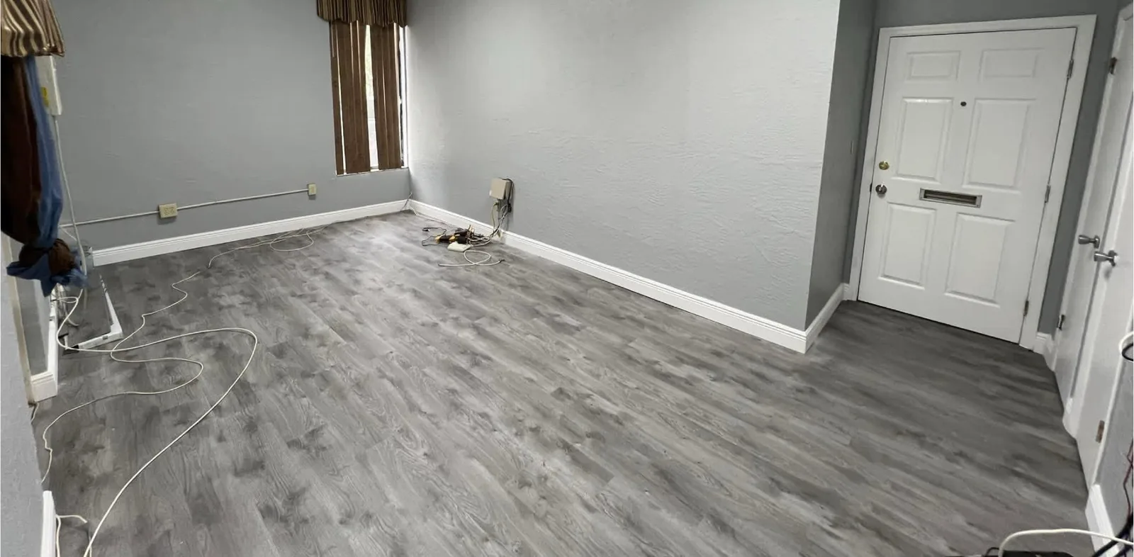 Home Office Refresh after the work — a finished home office with fresh paint and new flooring