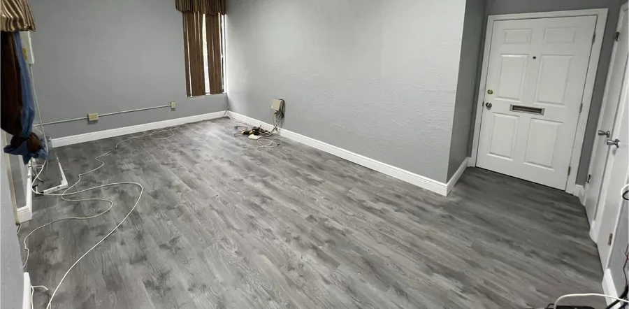 Home Office Refresh after the work — a finished home office with fresh paint and new flooring